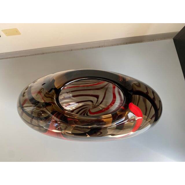 Abstract vase in smoked Murano glass and red reeds