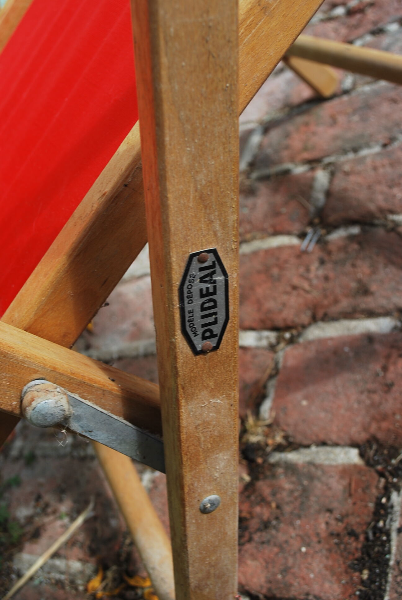Chaise camping vintage rouge