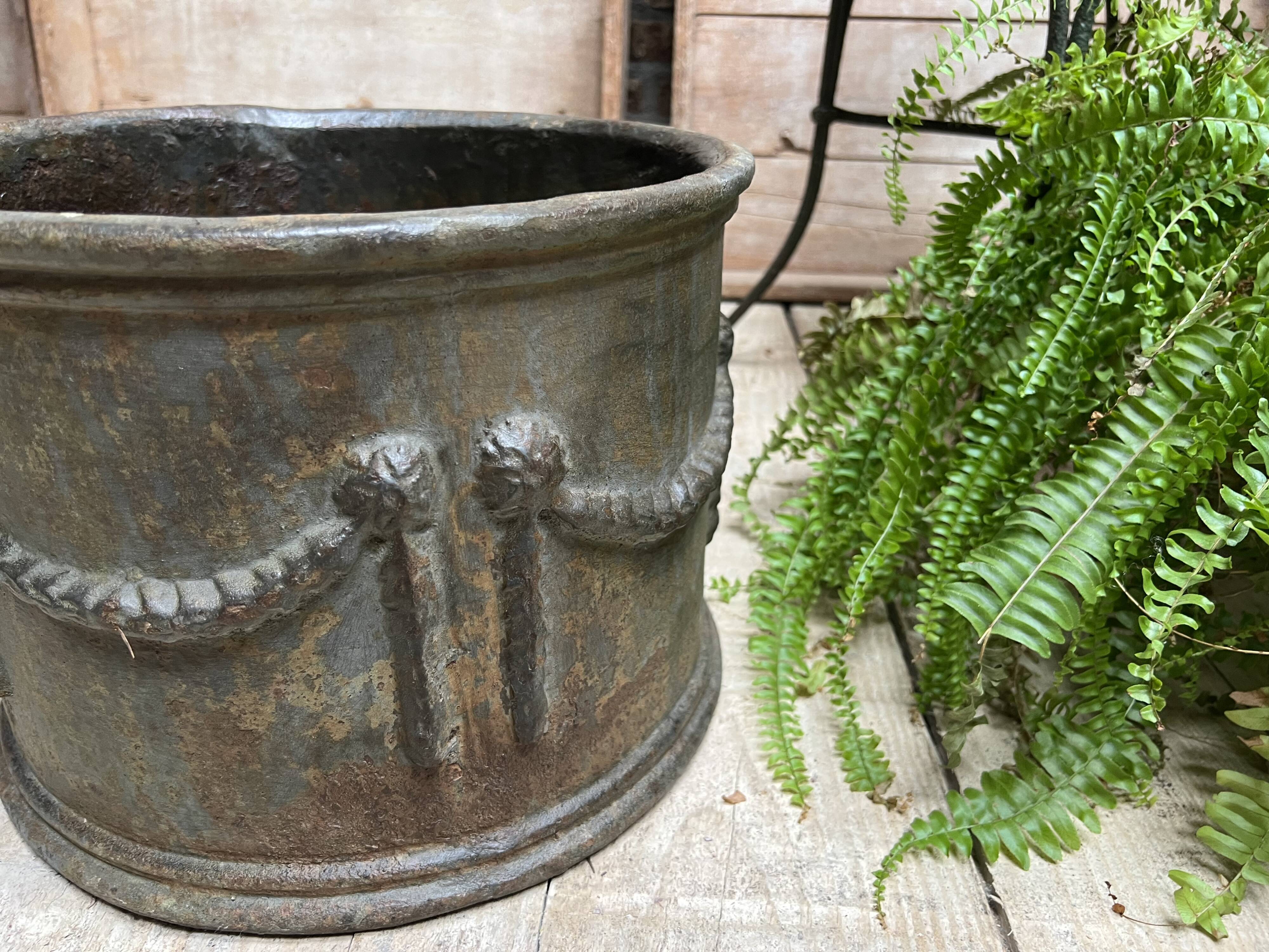 Pair of cast iron planters