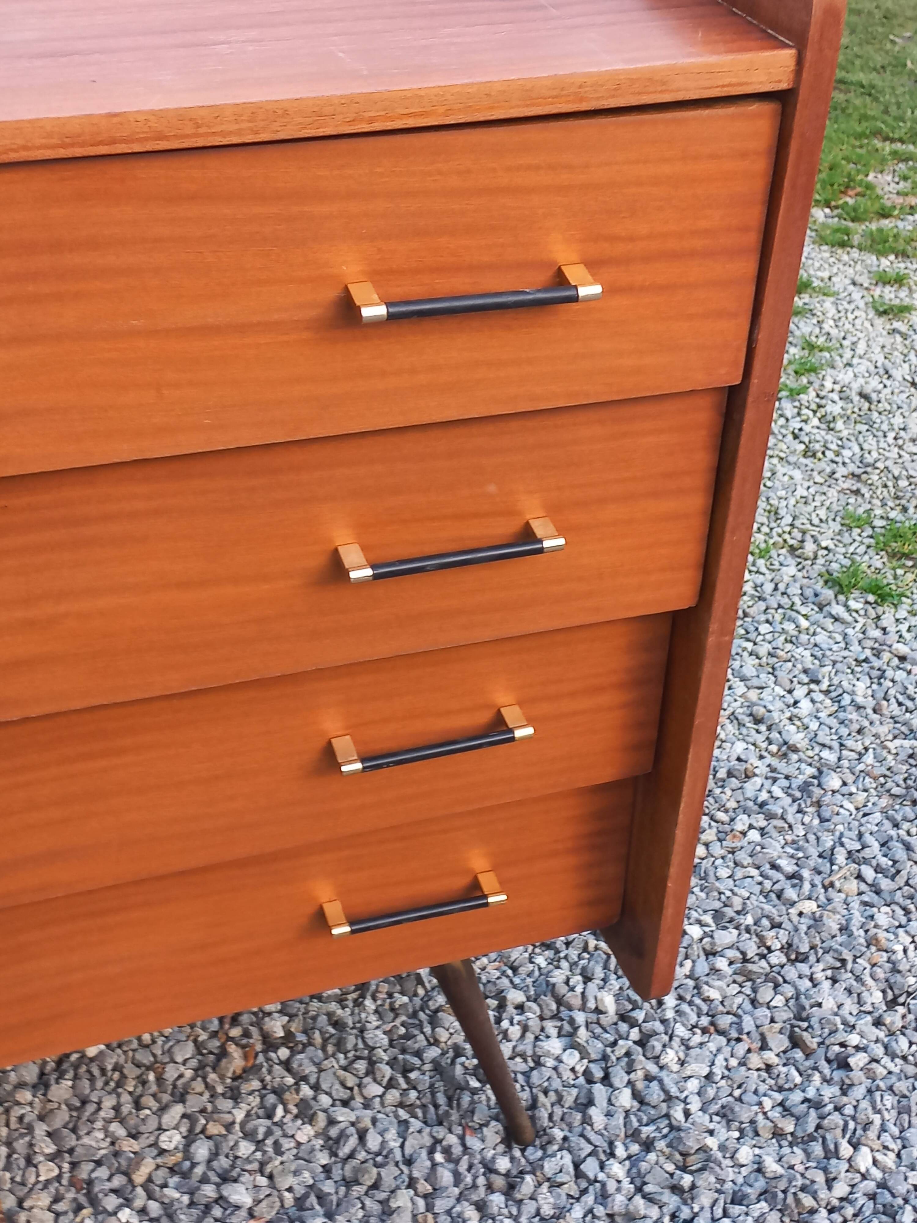 Vintage mahogany commode with metal tapered legs, 4 drawers, 1950s.