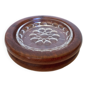 Wooden ashtray with removable glass.
