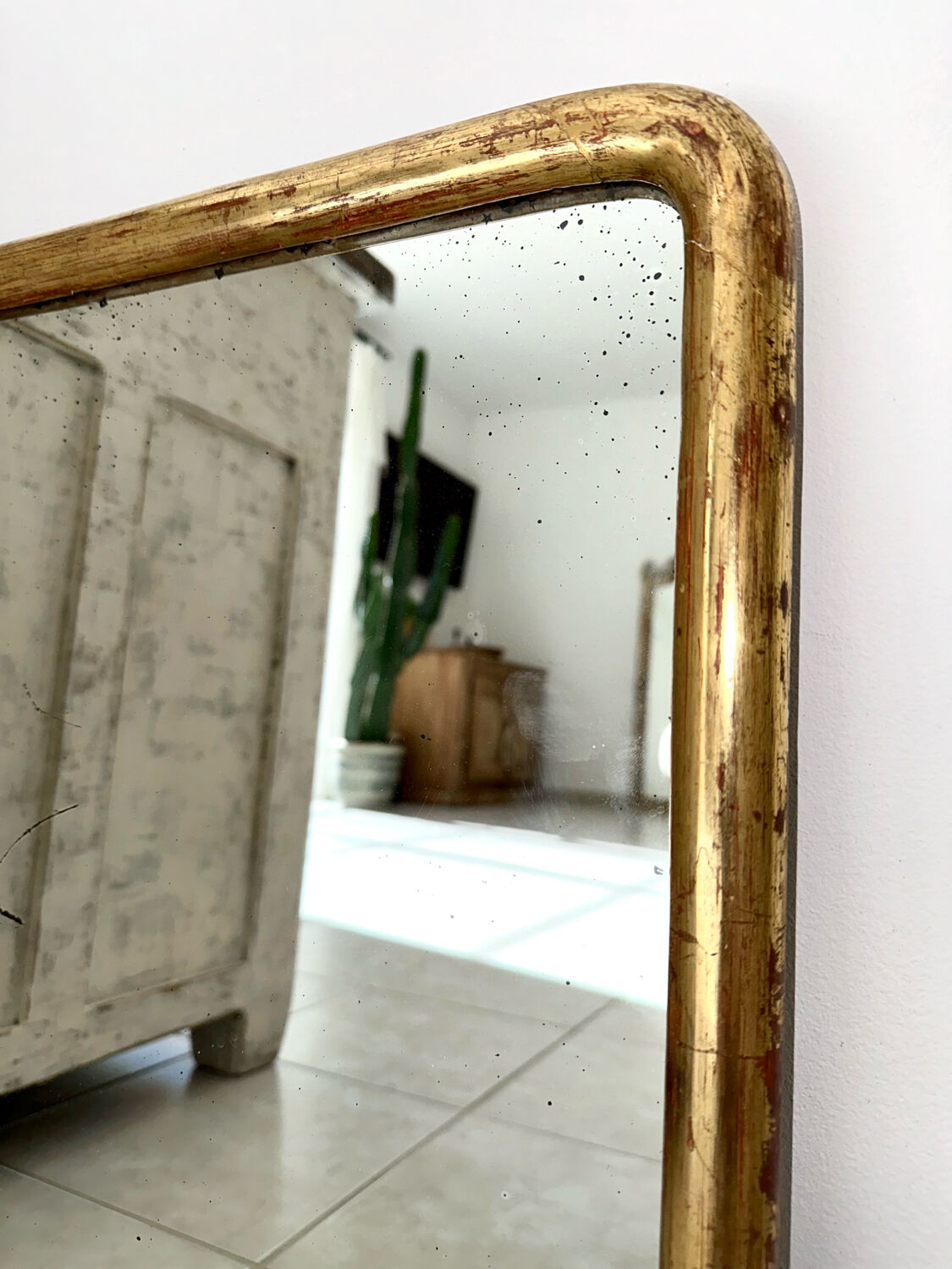 Antique gilded Louis-Philippe mirror, 19th century.