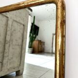 Antique gilded Louis-Philippe mirror, 19th century.