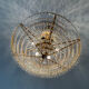 Chandelier cascade of tassels and brass