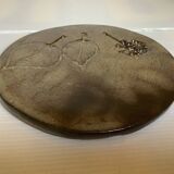 Brown ceramic trivet