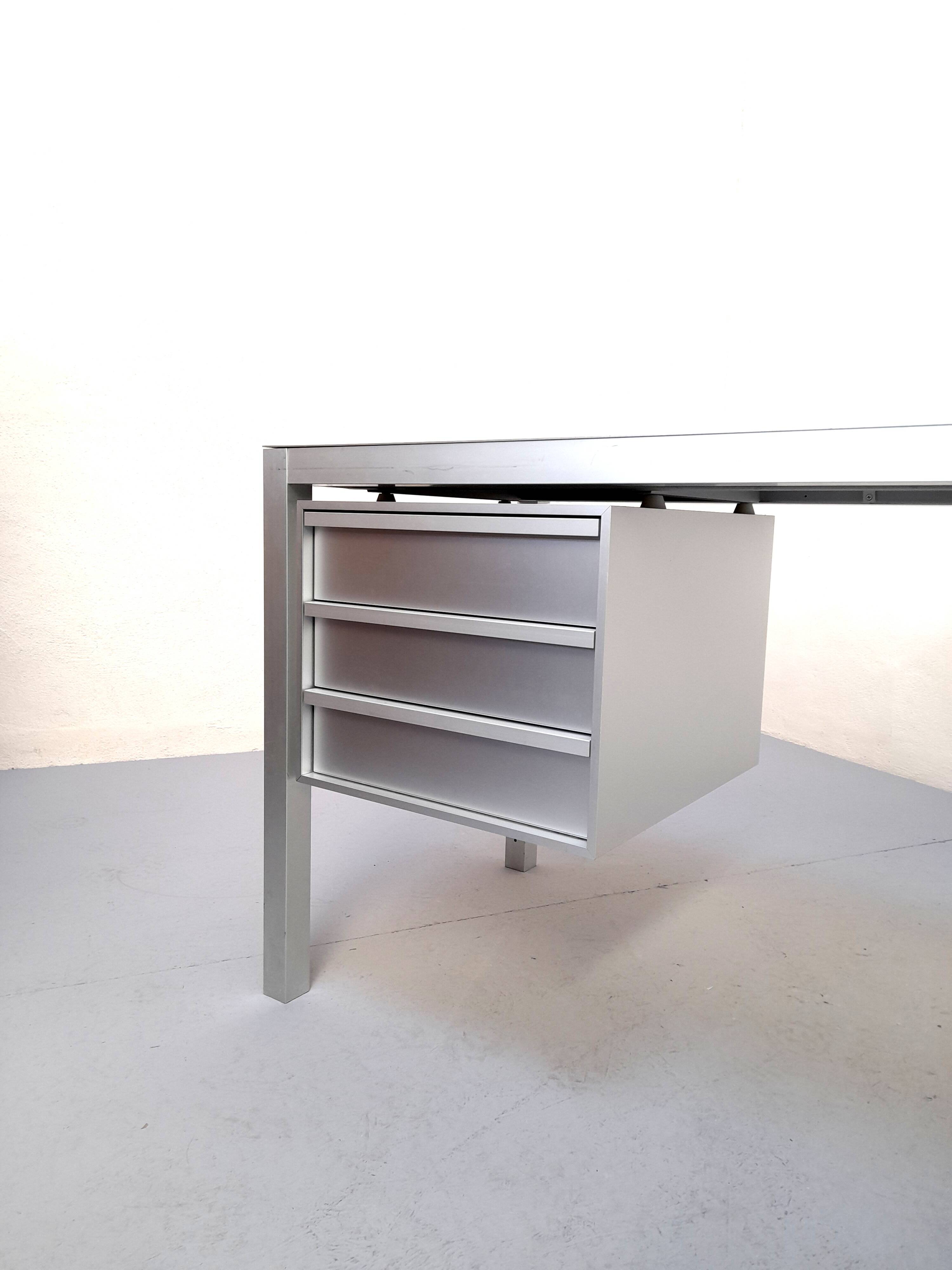Brushed aluminum desk by MDF Italia