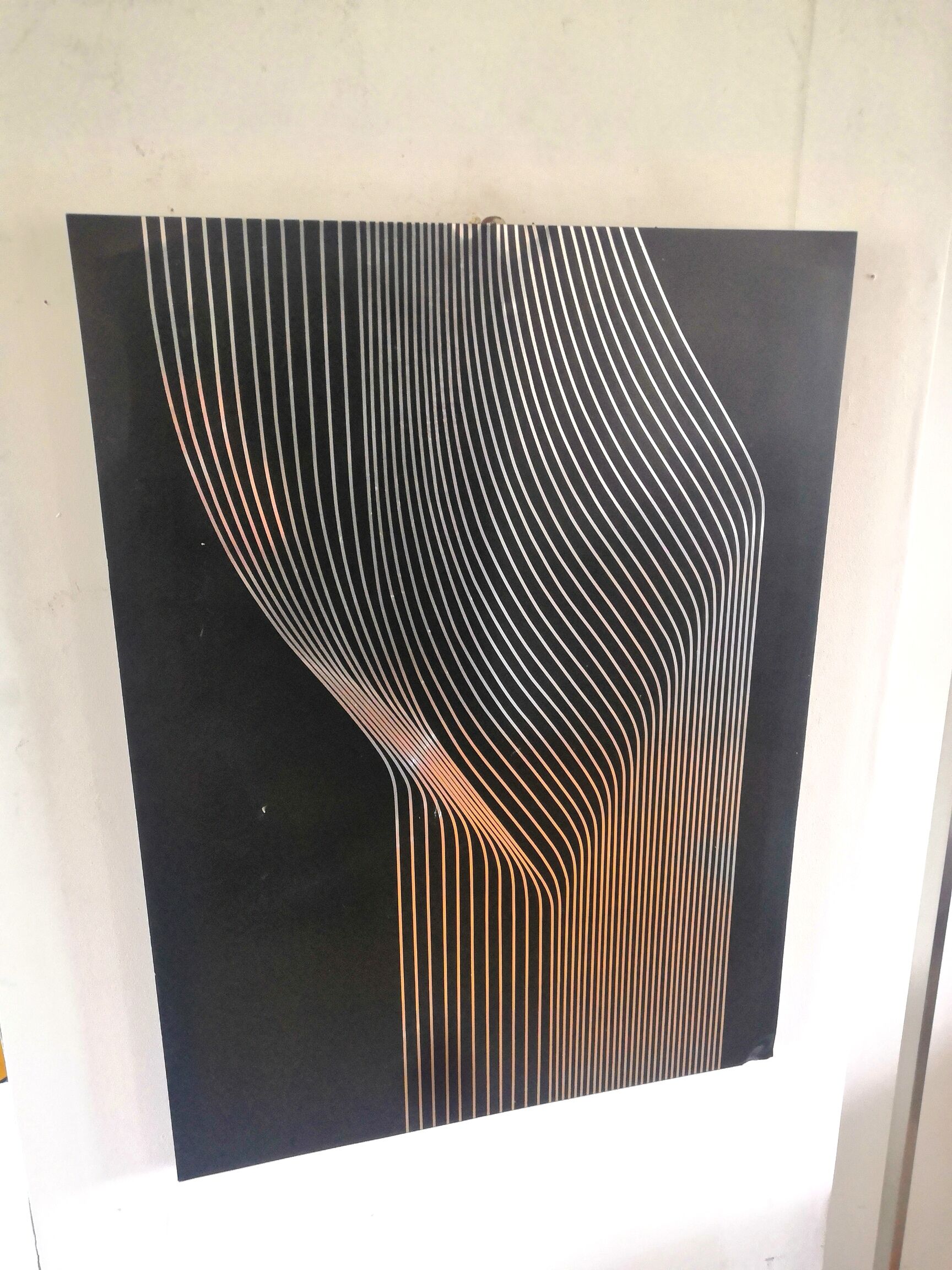 Vintage kinetic table on stainless steel plate