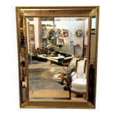 Miroir ancien biseauté doré style Louis XVI