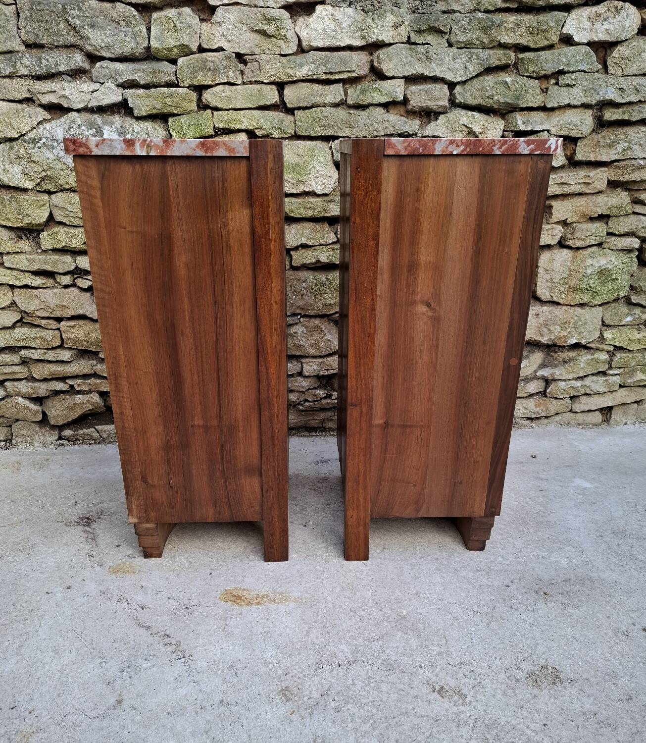 Corner bedside tables, in walnut