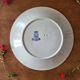 Old opaque porcelain plate gien terre de fer "laurels"