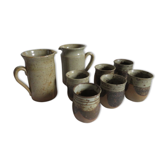 Pitchers and glass in varnished sandstone