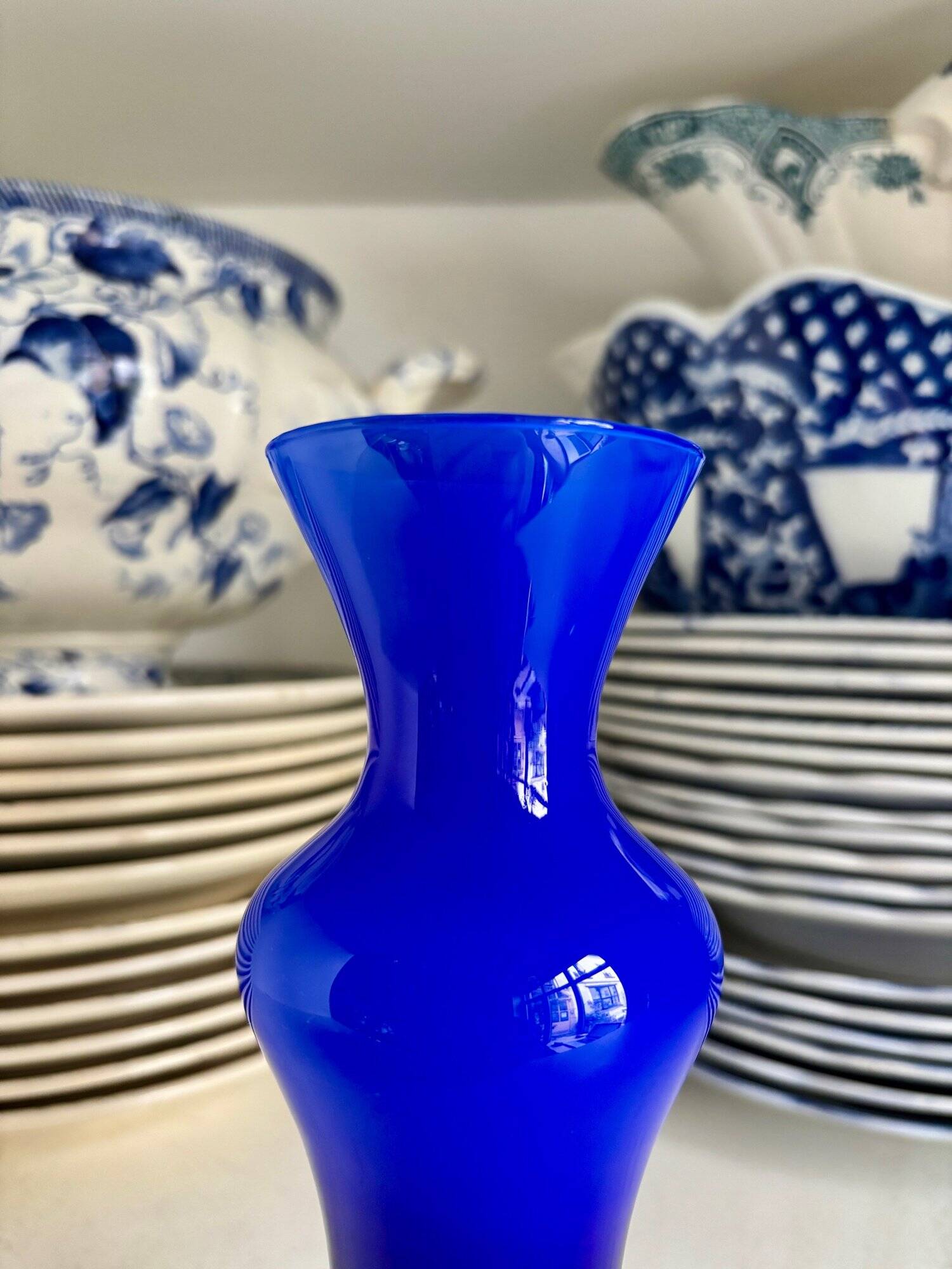 Blue and white opaline vase