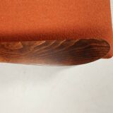 Vintage orange curly armchair Scandinavian design 1970
