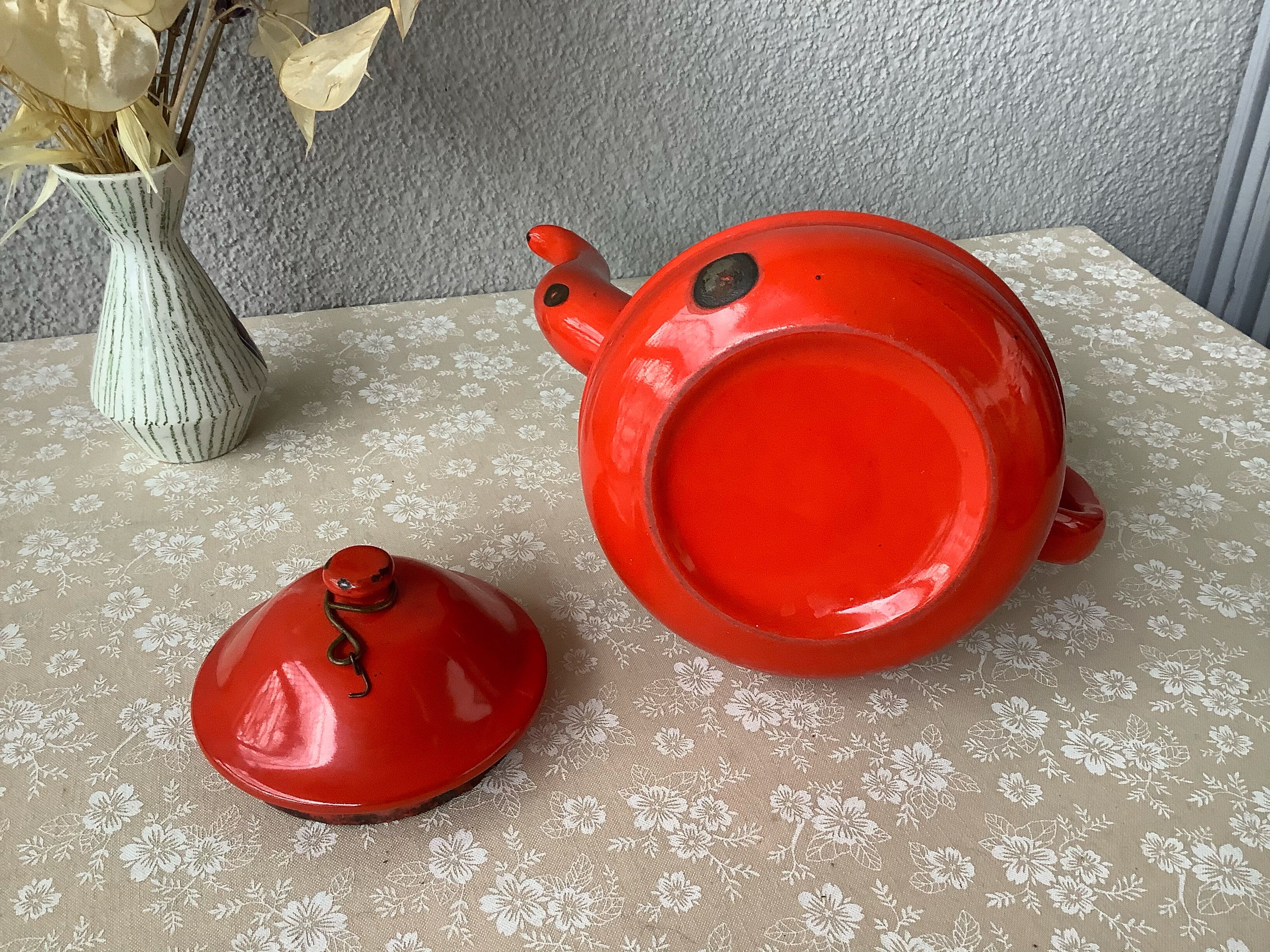 Vintage red enamelled tin teapot