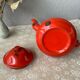 Vintage red enamelled tin teapot
