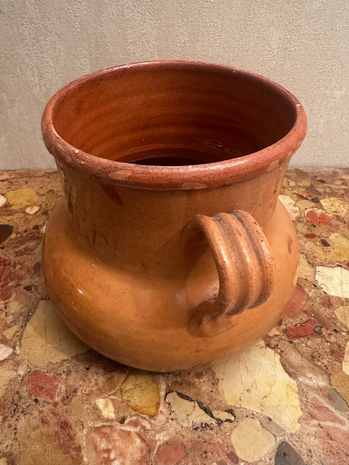 Old pot with handles in glazed Provençal pottery