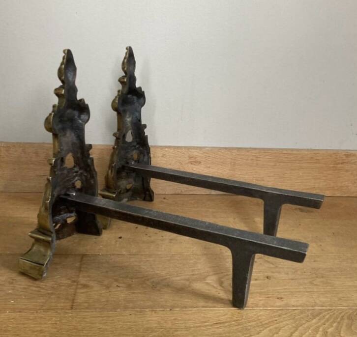 Pair of Louis XV andirons in solid bronze, early 20th century