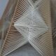 Hanging lamp of wood and thread Scandinavian style