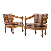 Pair of Giorgetti "1975 Gallery" armchairs in carved wood, original upholstery.