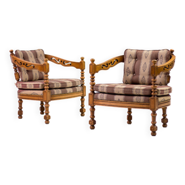 Pair of Giorgetti "1975 Gallery" armchairs in carved wood, original upholstery.