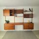 Danish wall-mounted bookshelf designed by Poul Cadovius, Scandinavian design.
