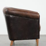 Characterful club armchair made of sheepskin with a beautiful patina