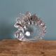 Shell-shaped crystal paperweight.