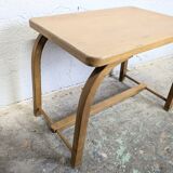 Old curved wooden children's desk.