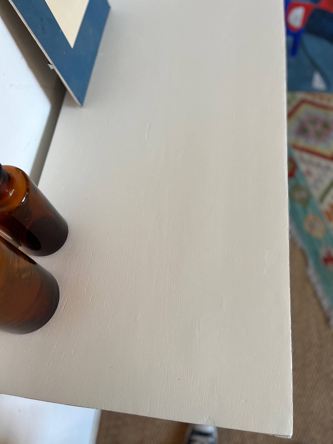 Restored wooden art deco chest of drawers with gilded handles