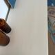 Restored wooden art deco chest of drawers with gilded handles