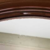 Round mirror with amber rim from the 70s, vintage