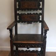 Set of an armchair and a pair of chairs in Italian Renaissance walnut