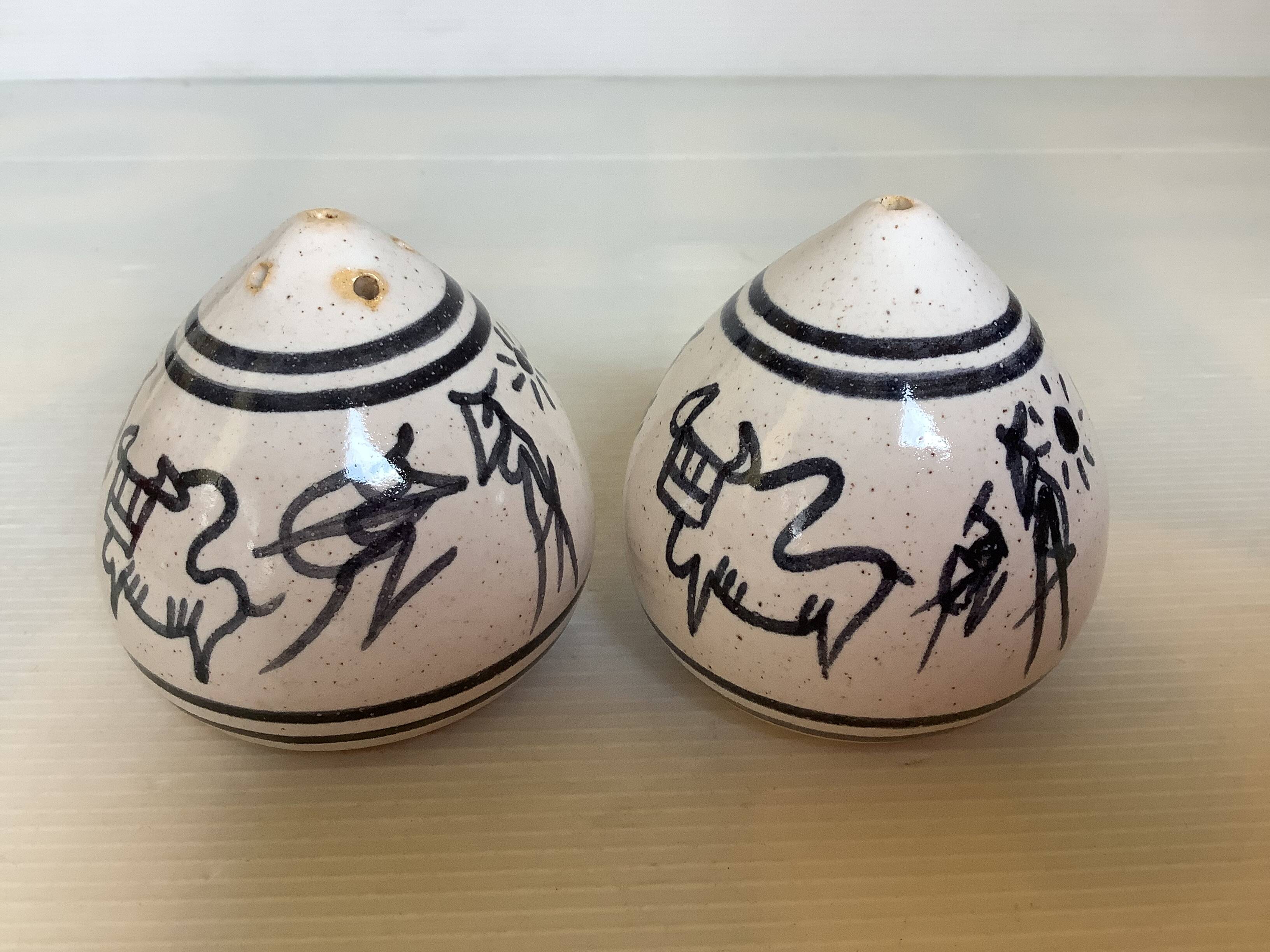 Hand-decorated ceramic salt and pepper shakers