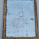Antique mirror in a gilded wooden frame in the Louis XVI style, 19th century, 62x78 cm.