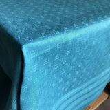 Old damask tablecloth tinted in lagoon blue