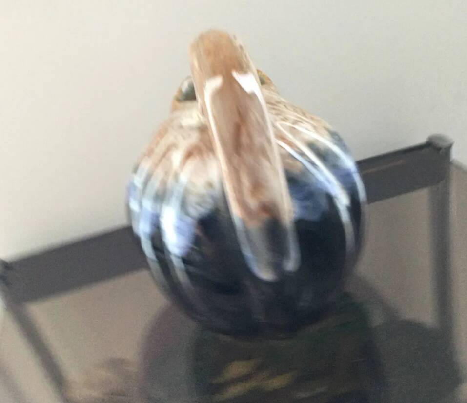 Ceramic melon jug signed