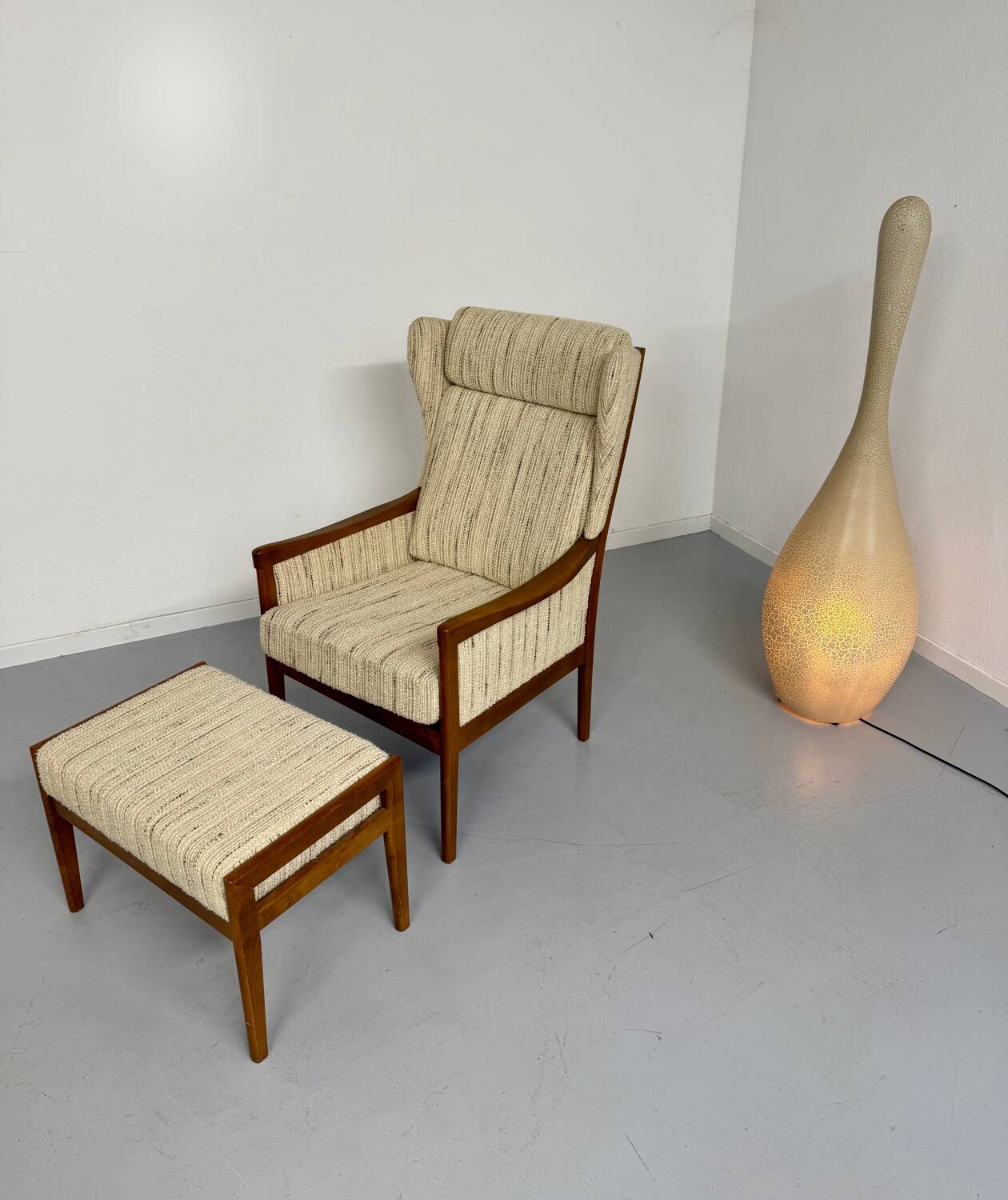 Vintage Casala wingback armchair with ottoman, 1970s design