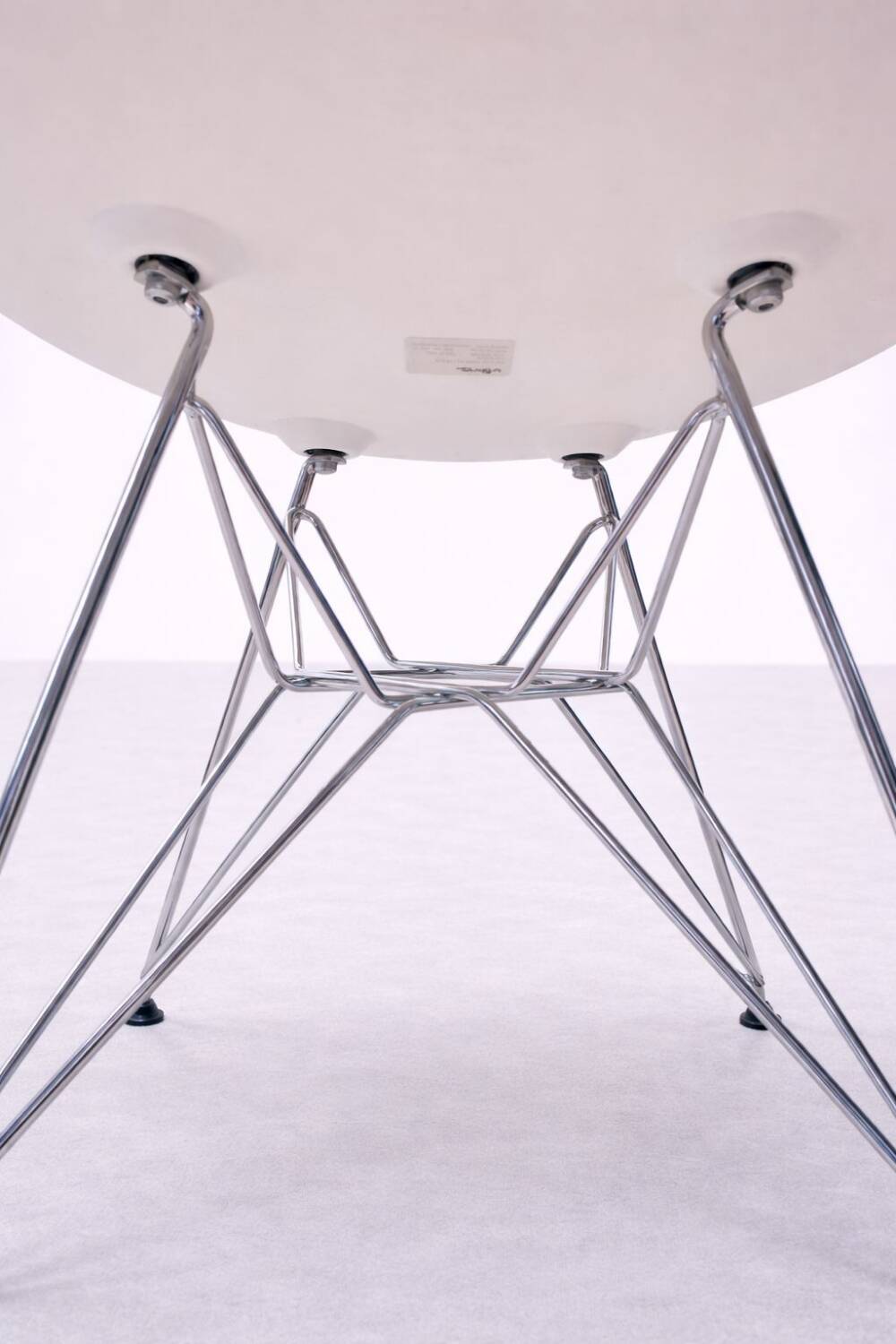 White DSR style Eames chair by Vitra with chrome Eiffel base.