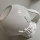White slip pitcher
