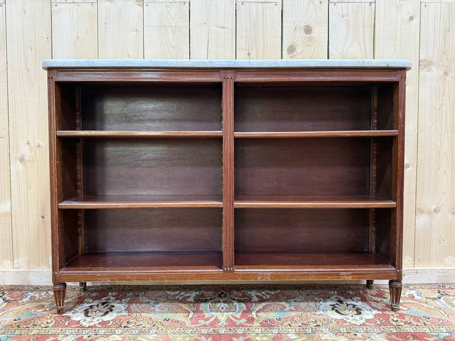 Large bookcase in the Louis XVI style.