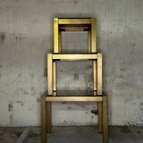 Trio of nesting tables, brass structures and smoked mirror tops