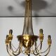 Neoclassical style brass chandelier decorated with pearl garlands