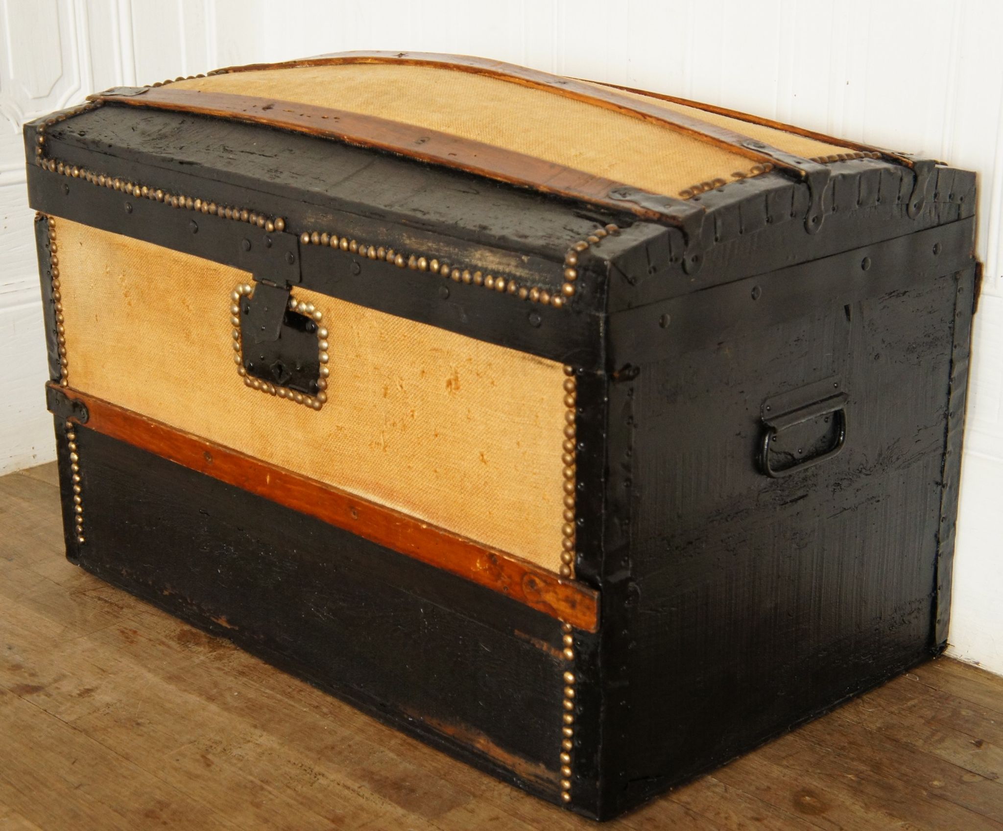 Old-curved wooden trunk - burlap