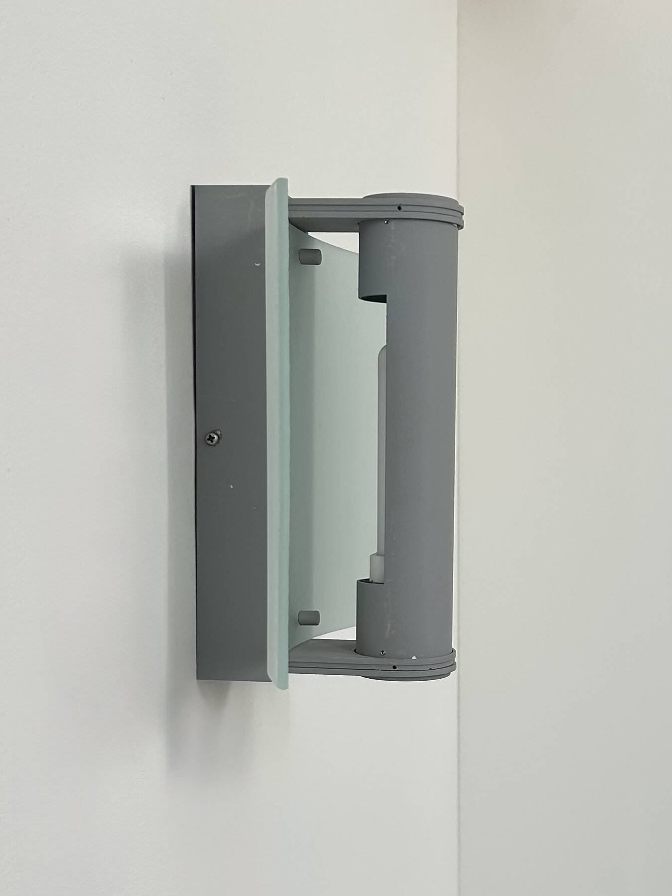 Vintage wall light, grey lacquered metal and frosted curved glass, France, 1980.