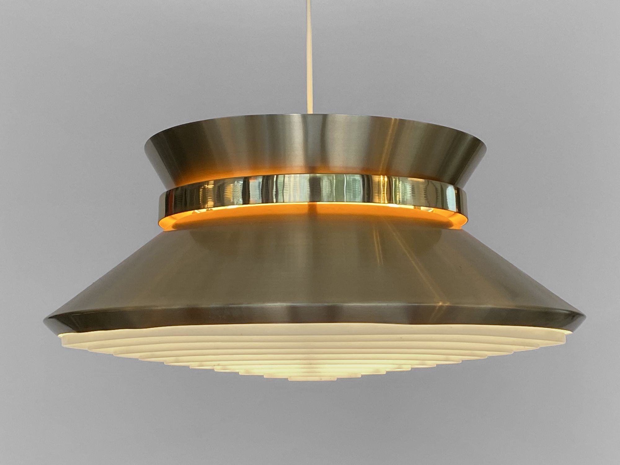 Brass colored aluminium pendant light by Carl Thore for Granhaga Metall. Sweden 1970s