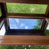 Glass-enclosed old tea table with wooden tray, bronze and brass