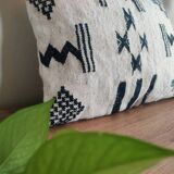 Geometric black and white kilim cushion