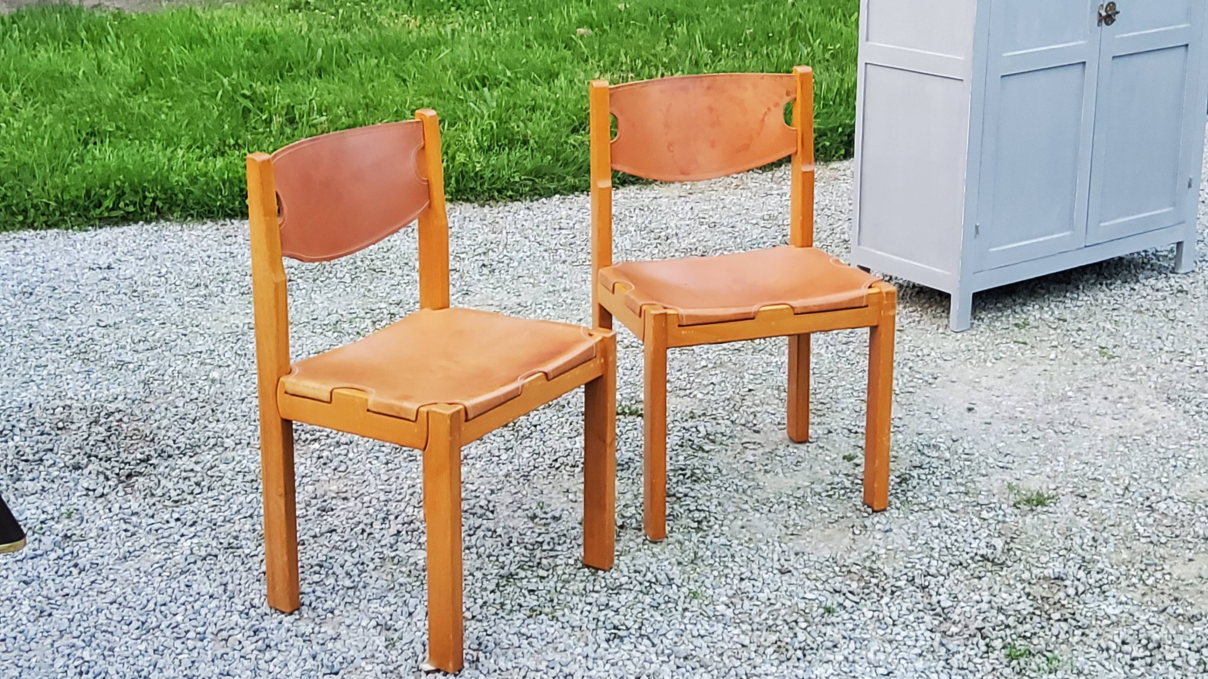 Pair of brutalist chairs in elm and stretched leather with saddle stitching Self publisher