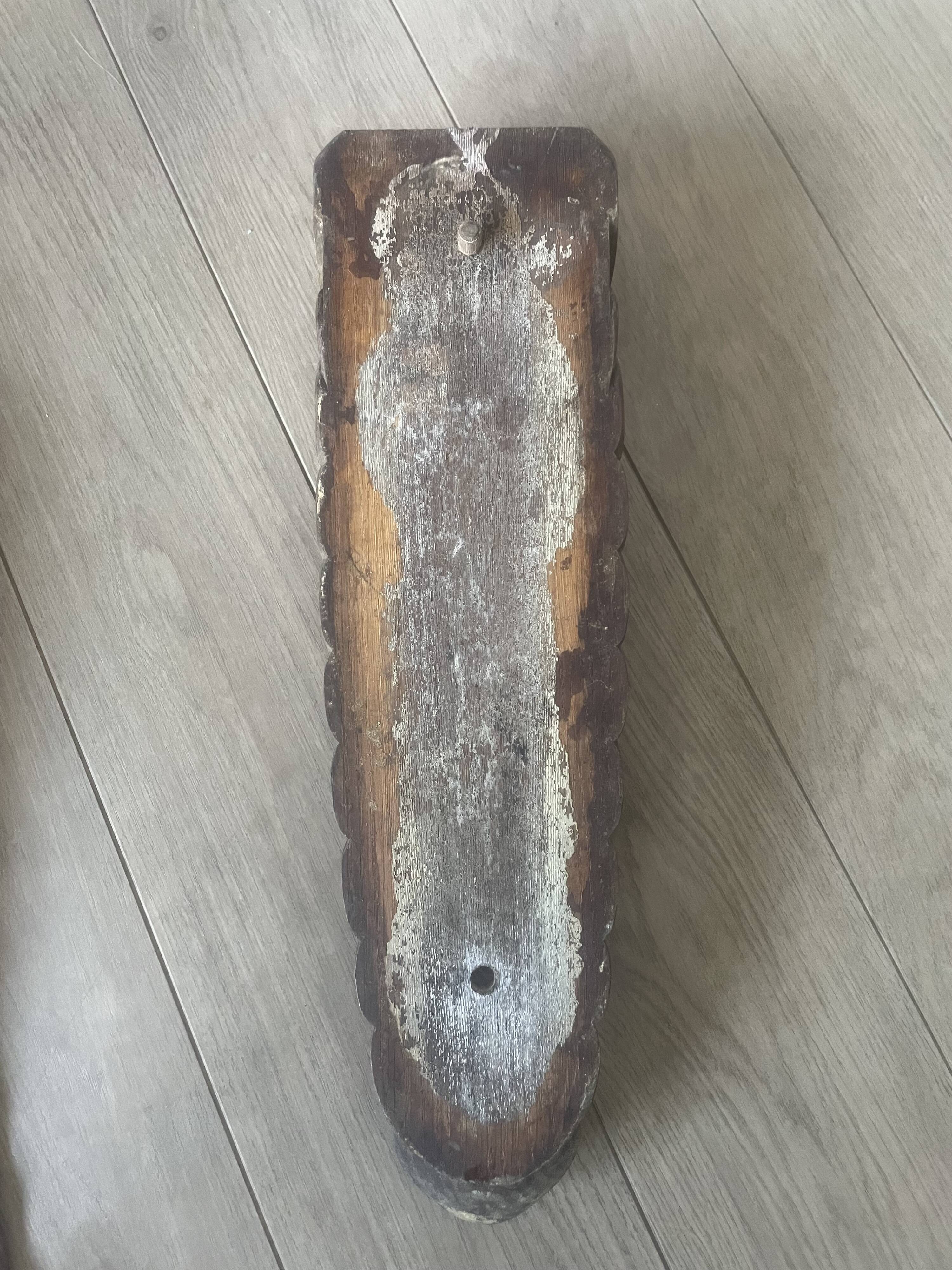 four decorative carved wooden objects