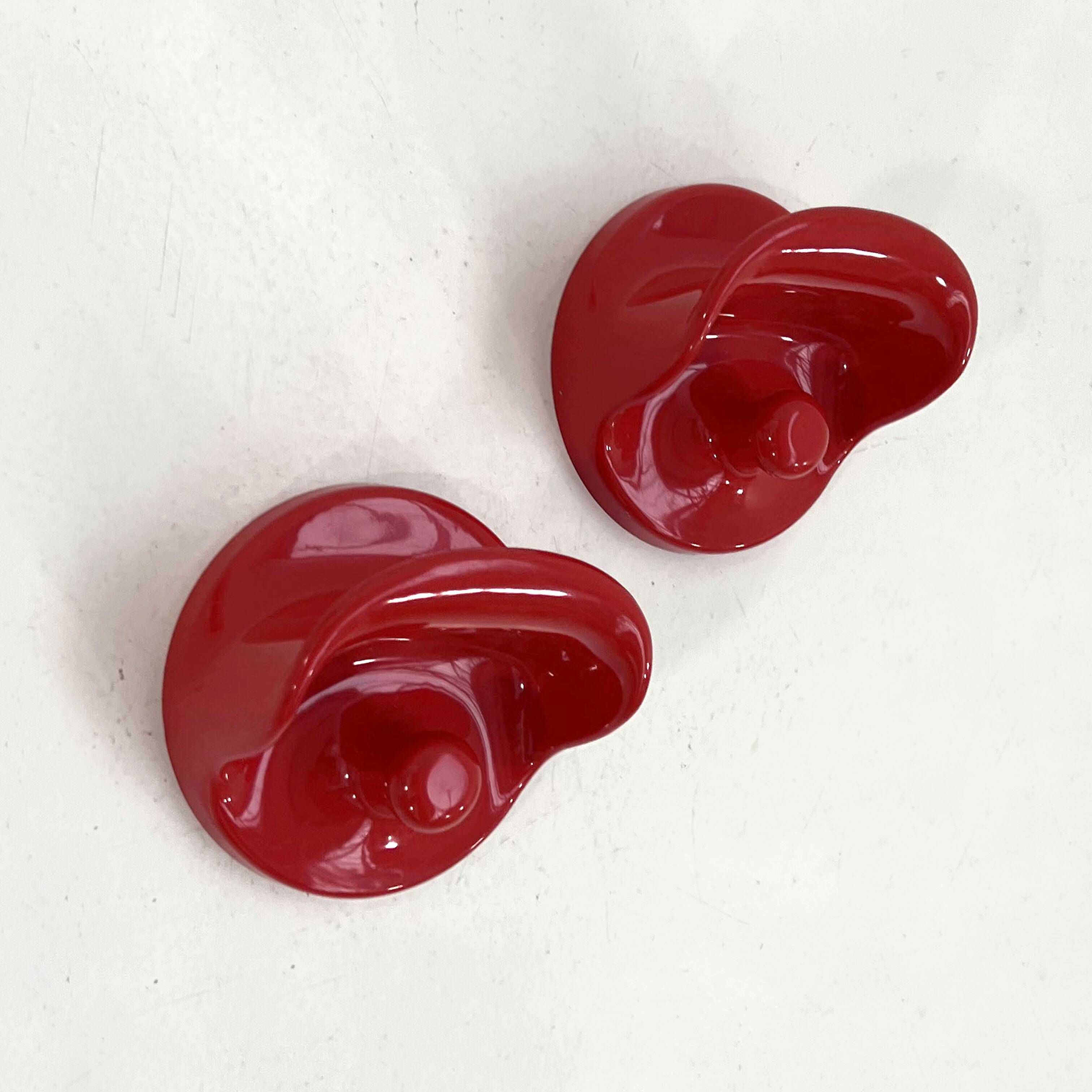 Set of 2 red "gancio 4702" coat hooks by olaf von bohr for kartell, 1970.